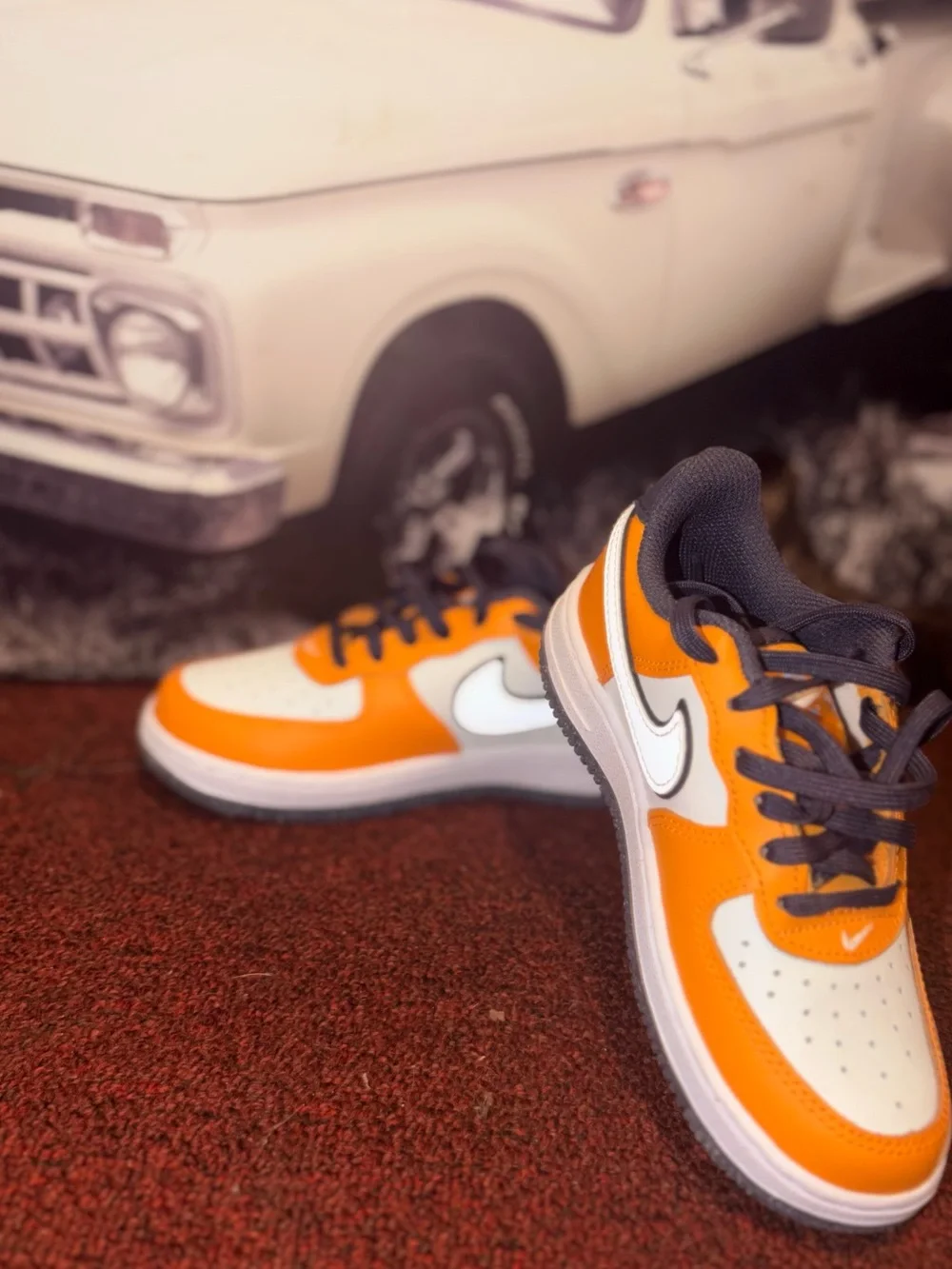 Nike Kids Orange and Gray Low-Top Sneakers with Smiley Heel